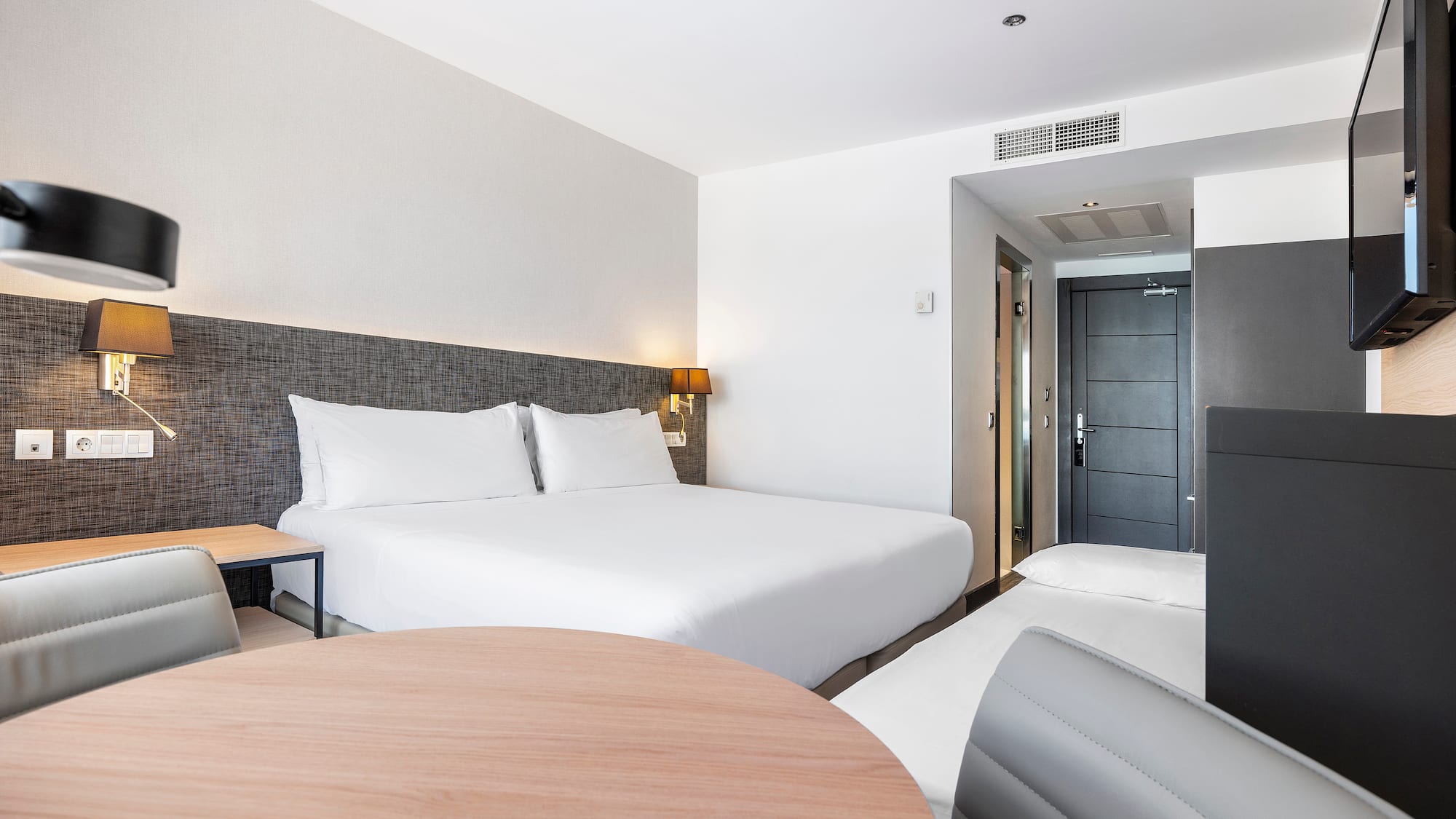 a room with a bed and a table