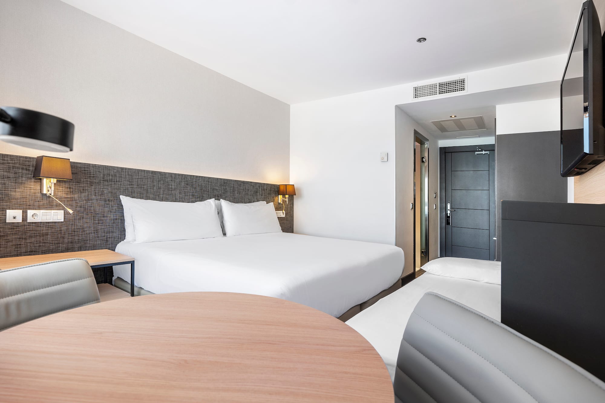 a room with a bed and a table