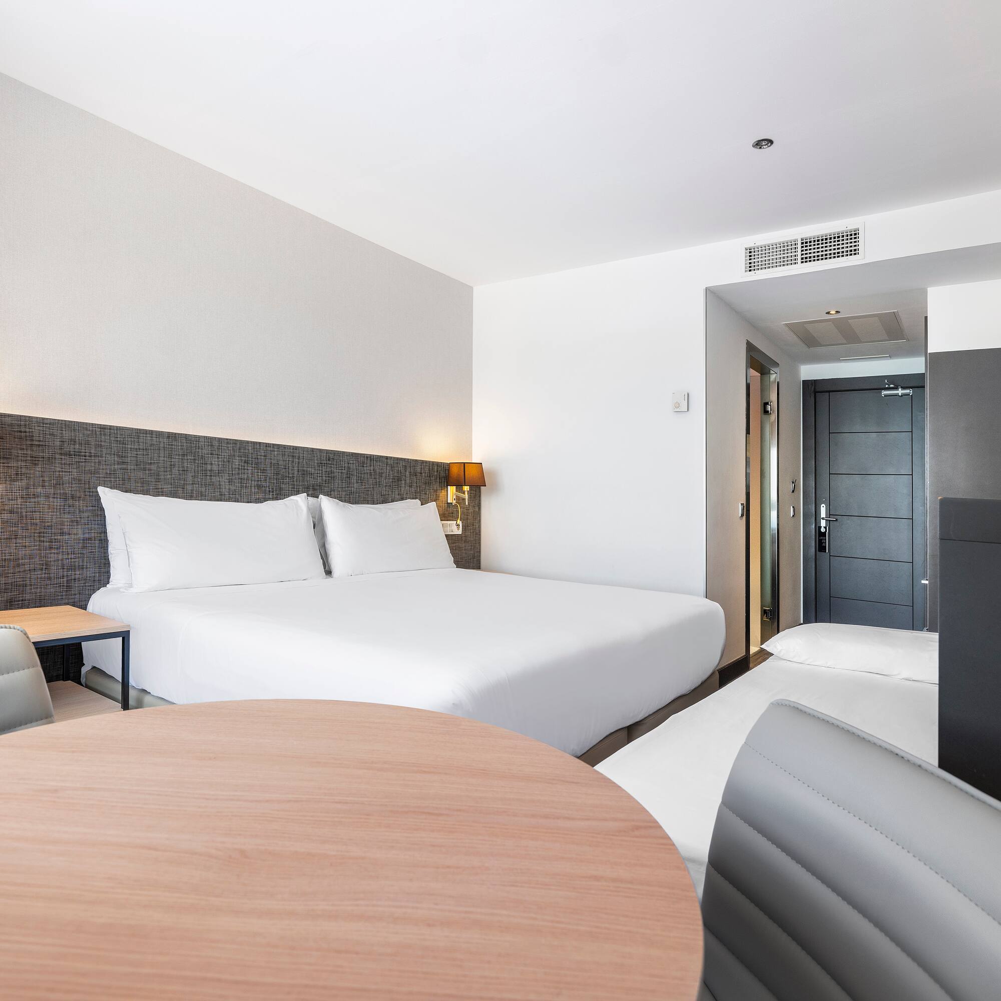 a room with a bed and a table