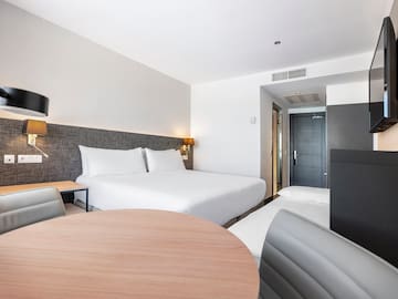 a room with a bed and a table