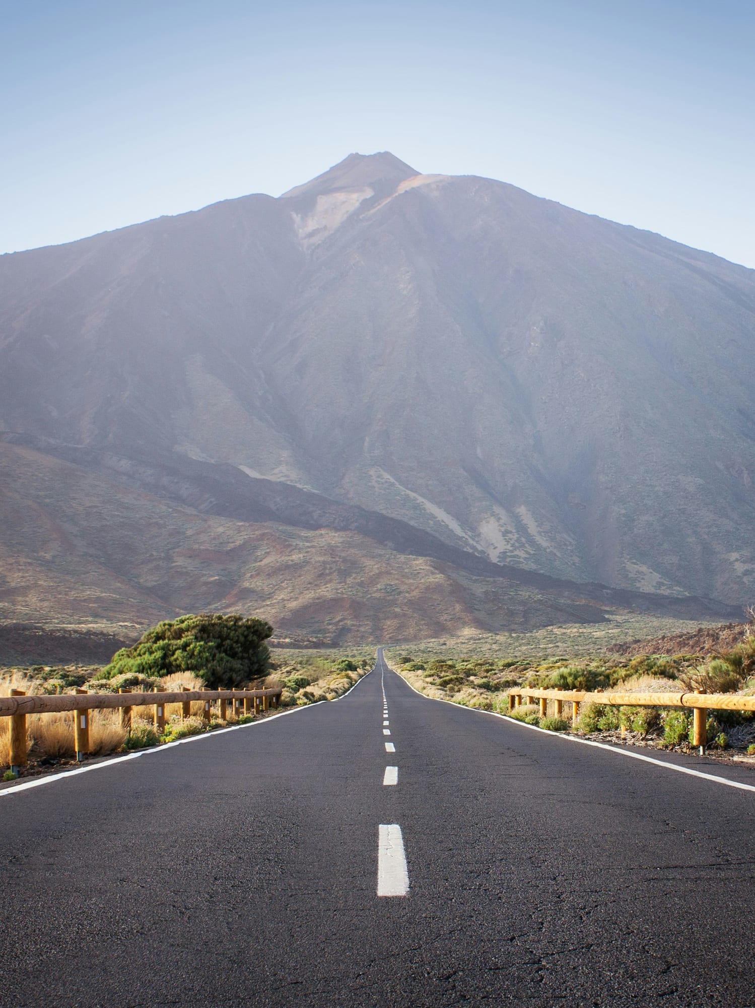 Long road toward Teide volcano, Tenerife. Arid volcanic national park.