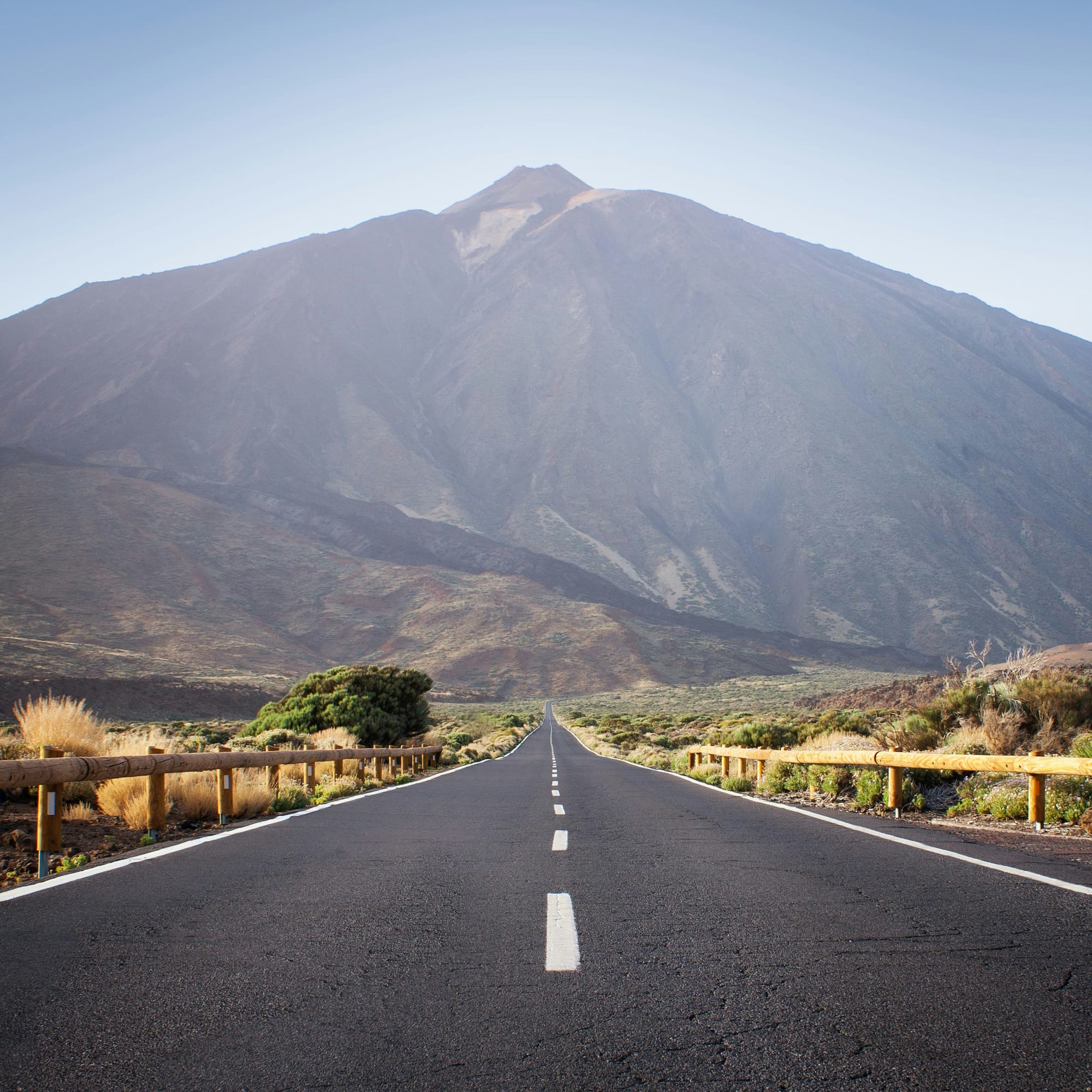 Long road toward Teide volcano, Tenerife. Arid volcanic national park.