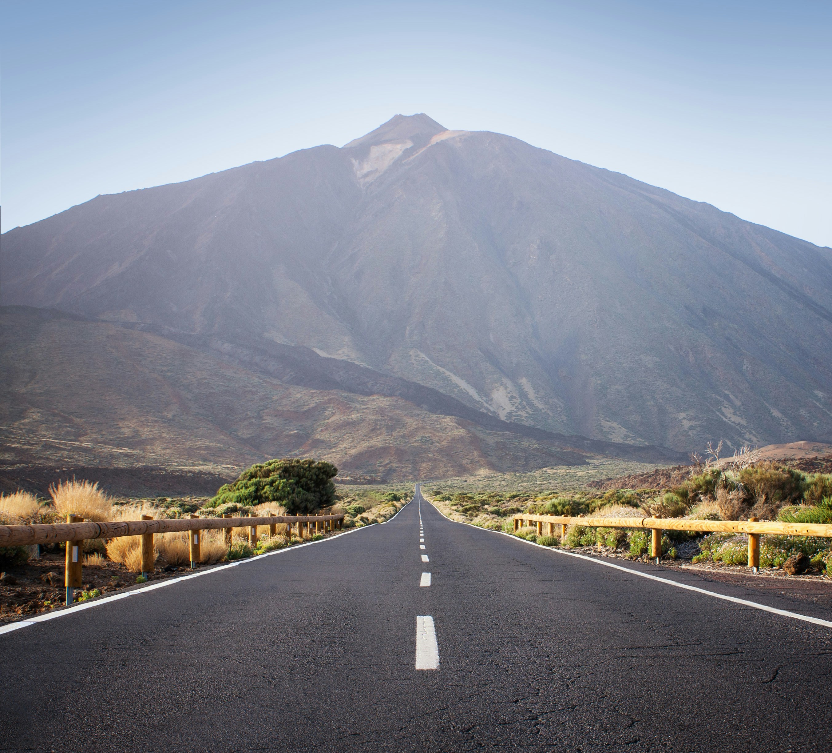 Long road toward Teide volcano, Tenerife. Arid volcanic national park.
