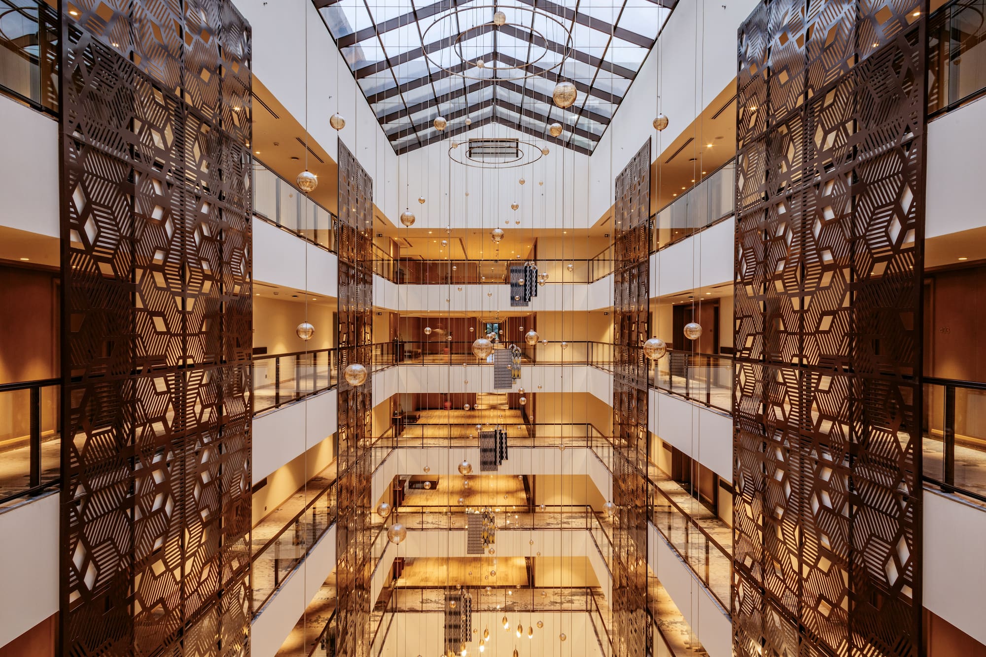 a building with many floors and glass walls