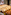 a tray of bread and croissants