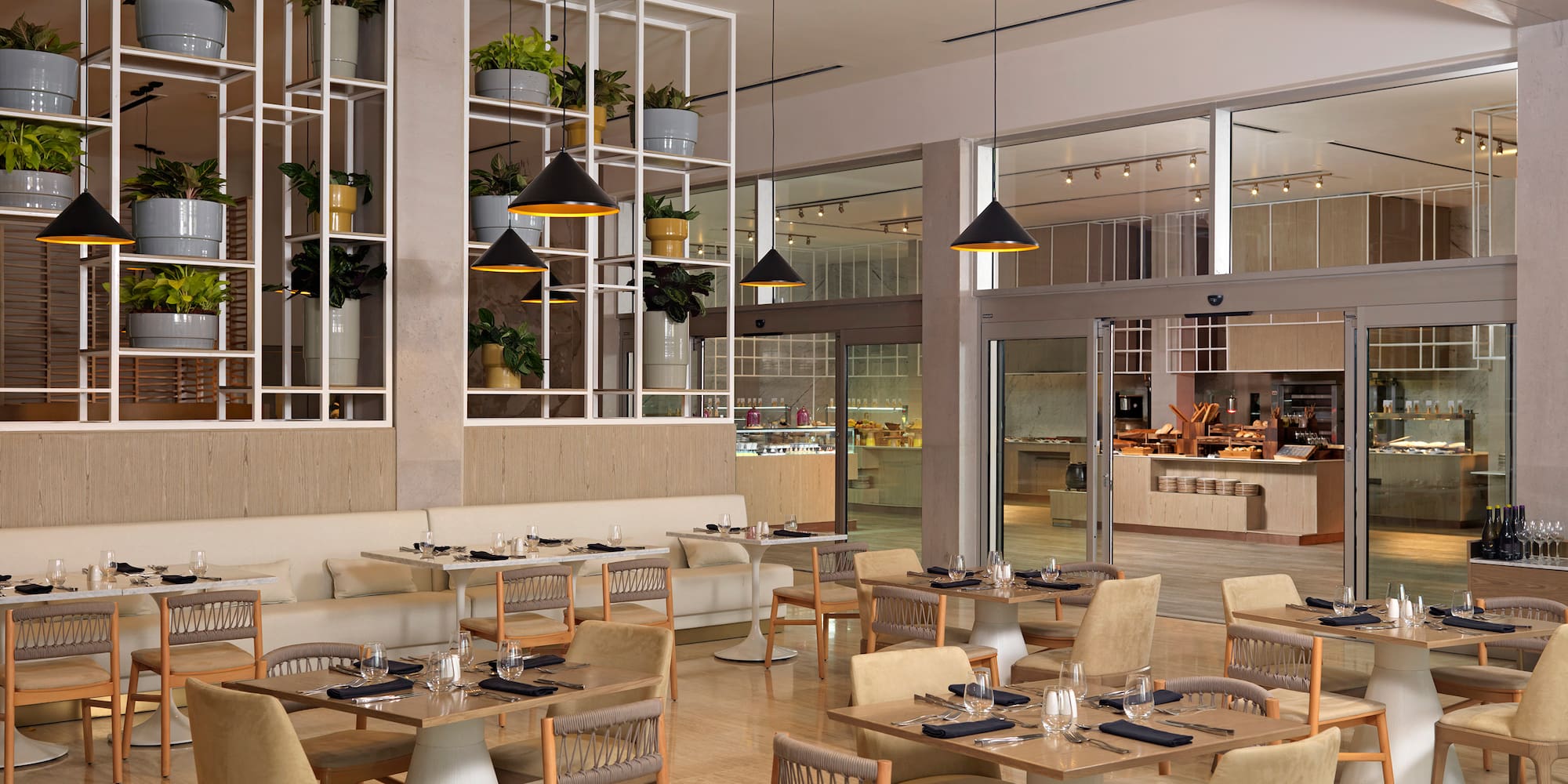 a restaurant with tables and chairs