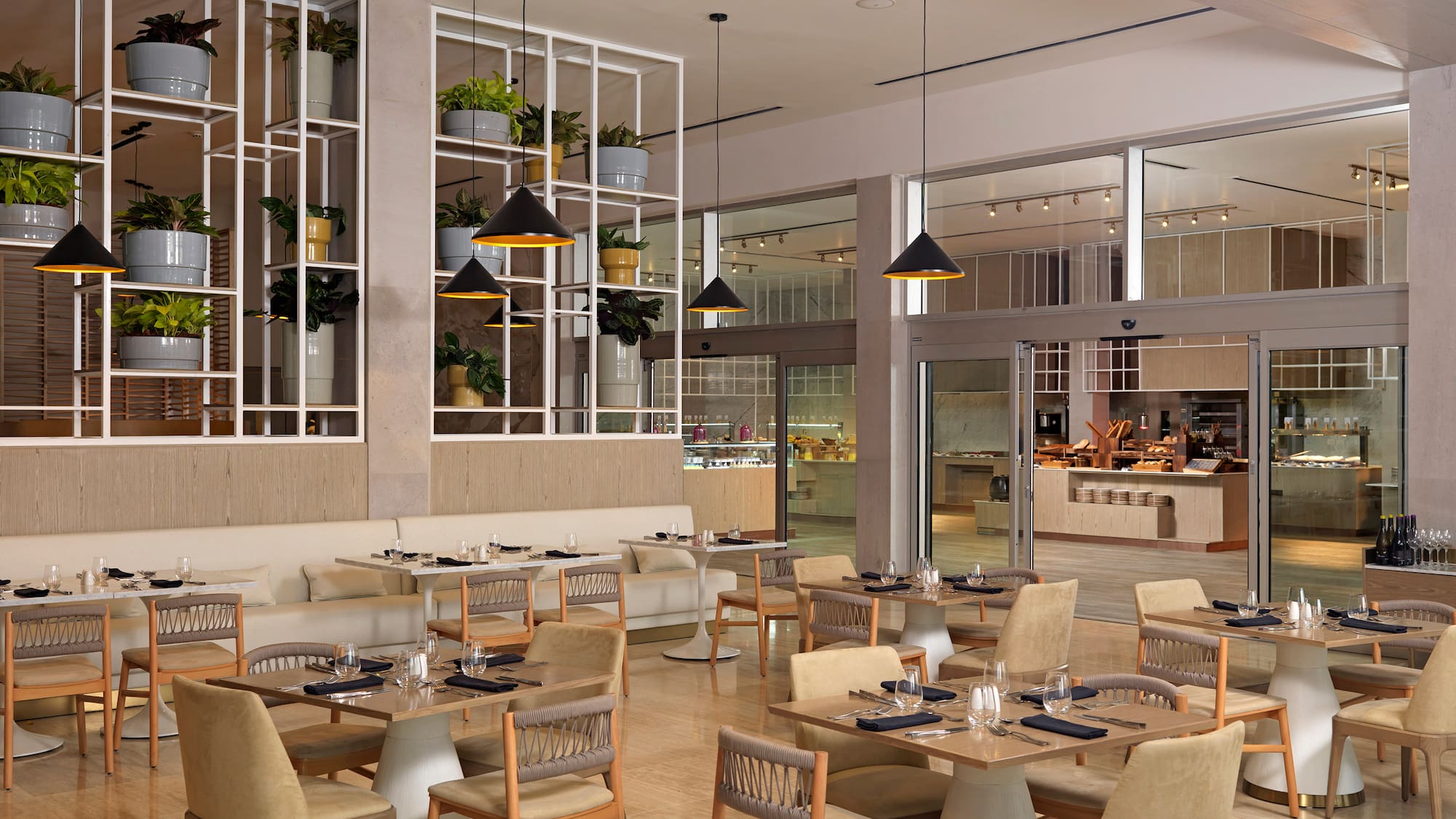 a restaurant with tables and chairs