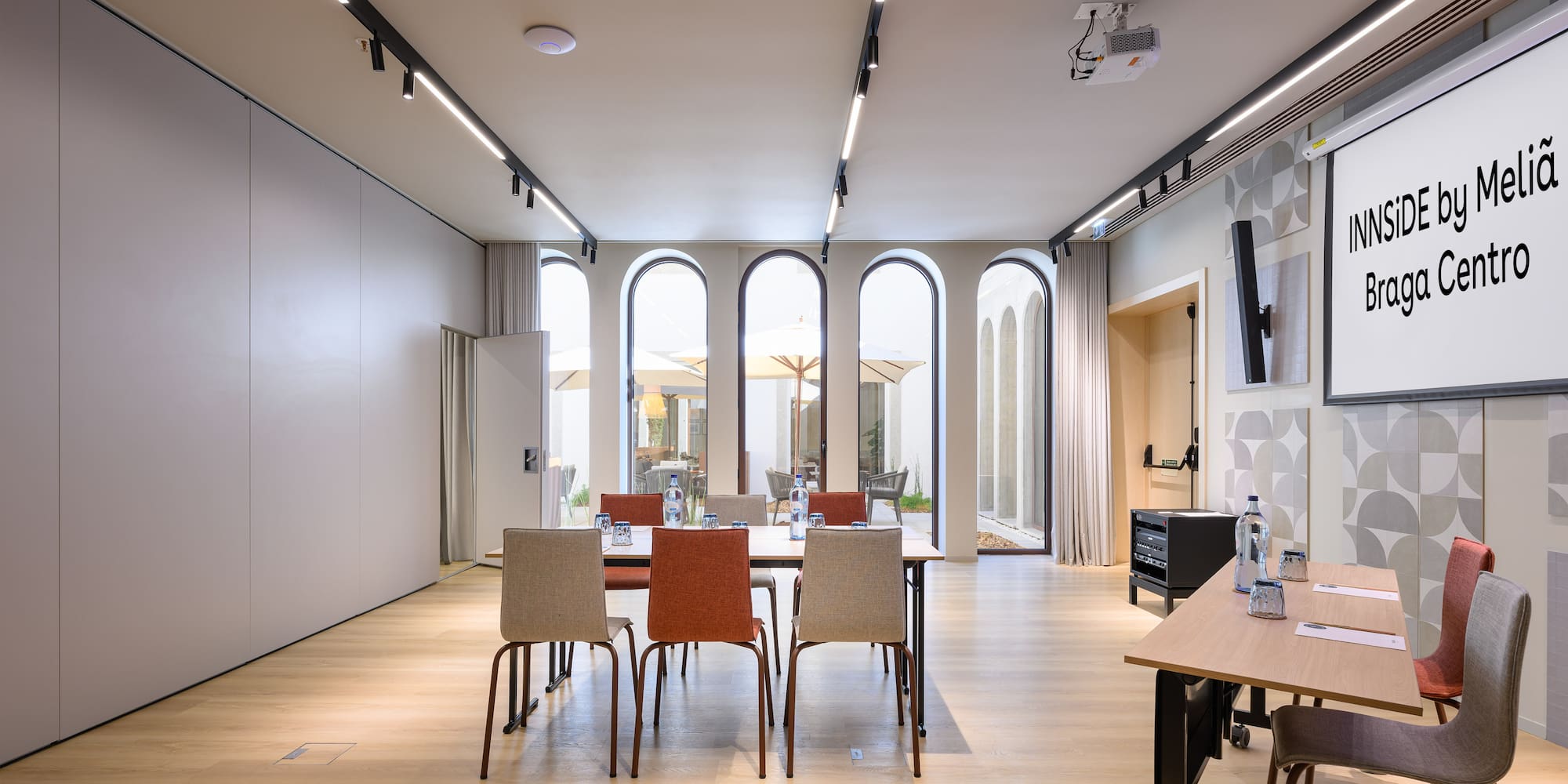 a room with a table and chairs