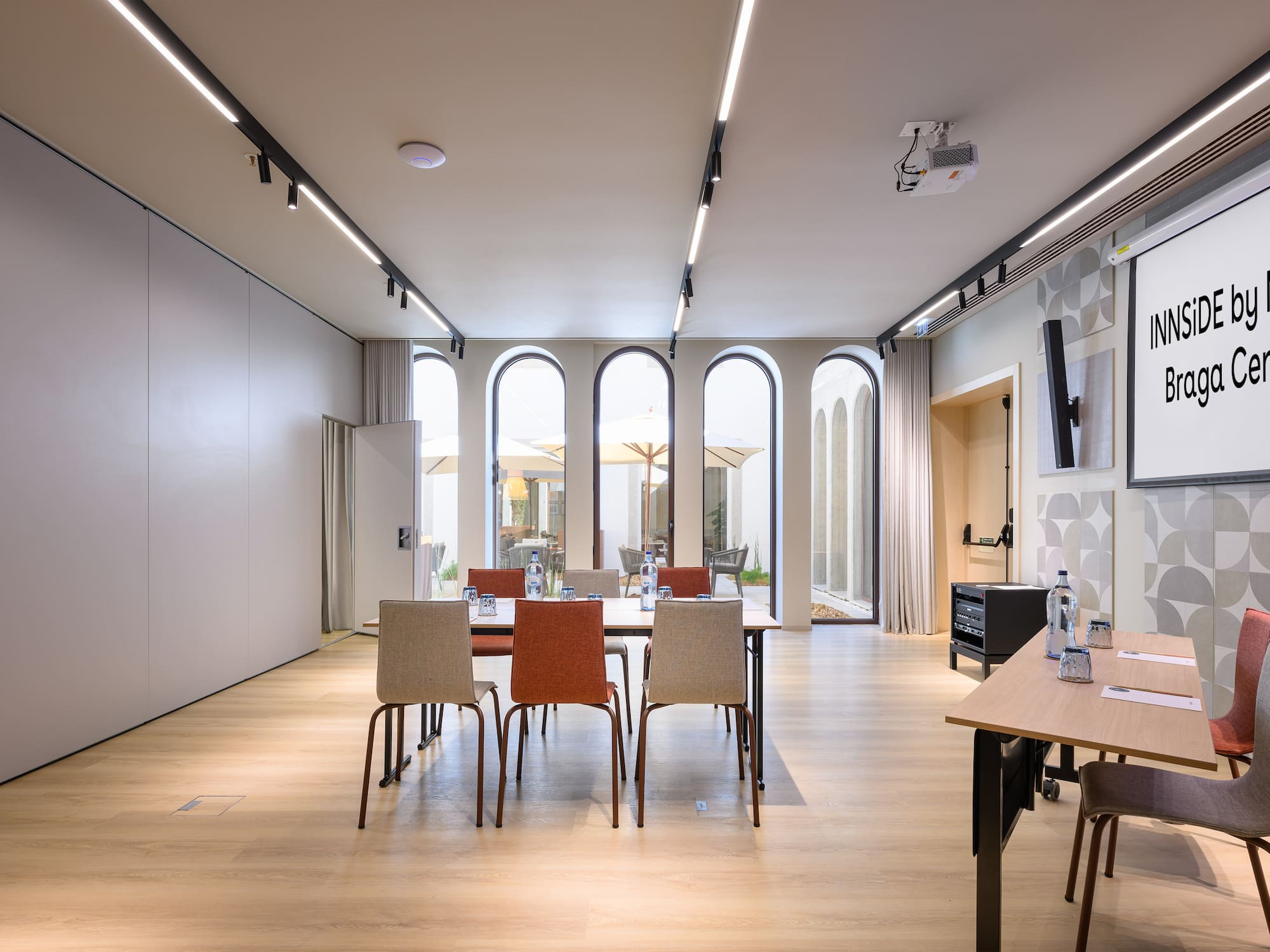 a room with a table and chairs