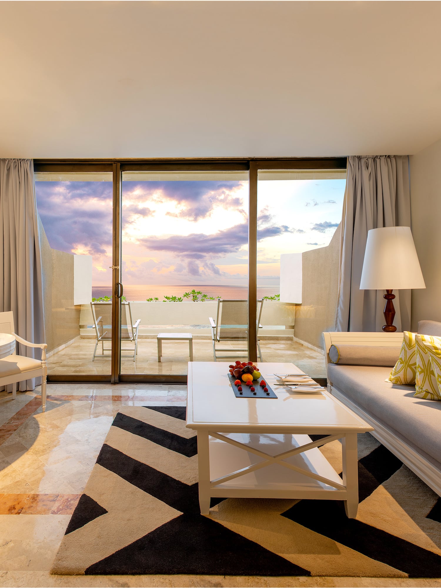 a living room with a couch and a table