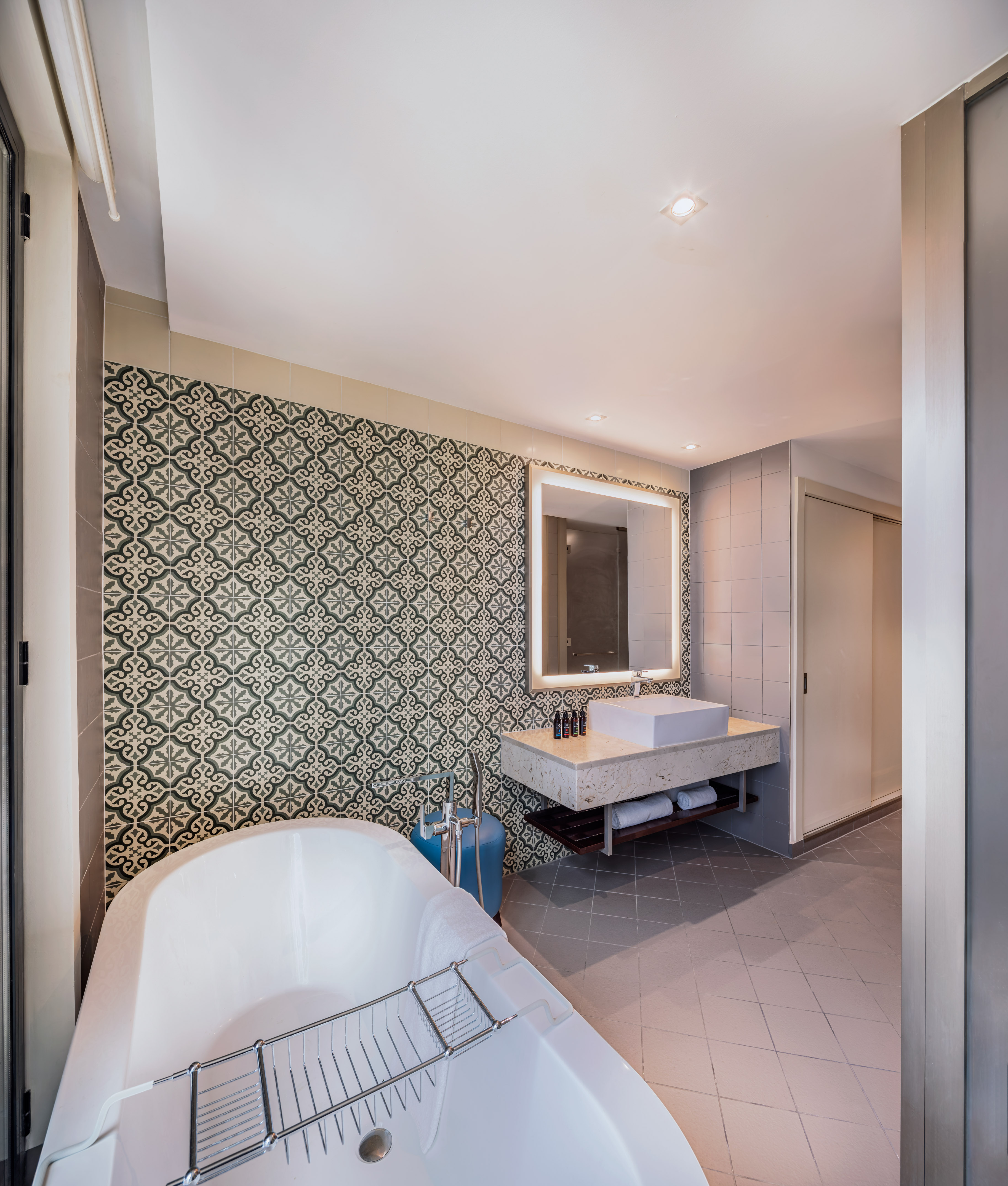 a bathroom with a tub and sink