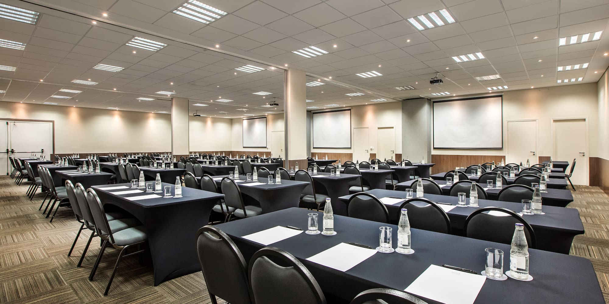 a room with tables and chairs