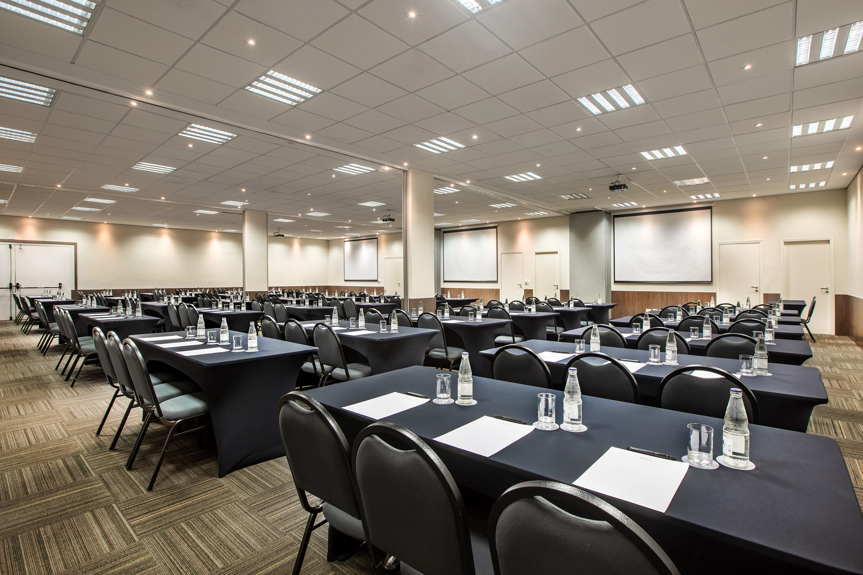 a room with tables and chairs