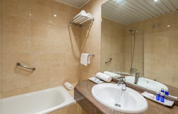 a bathroom with a sink and bathtub