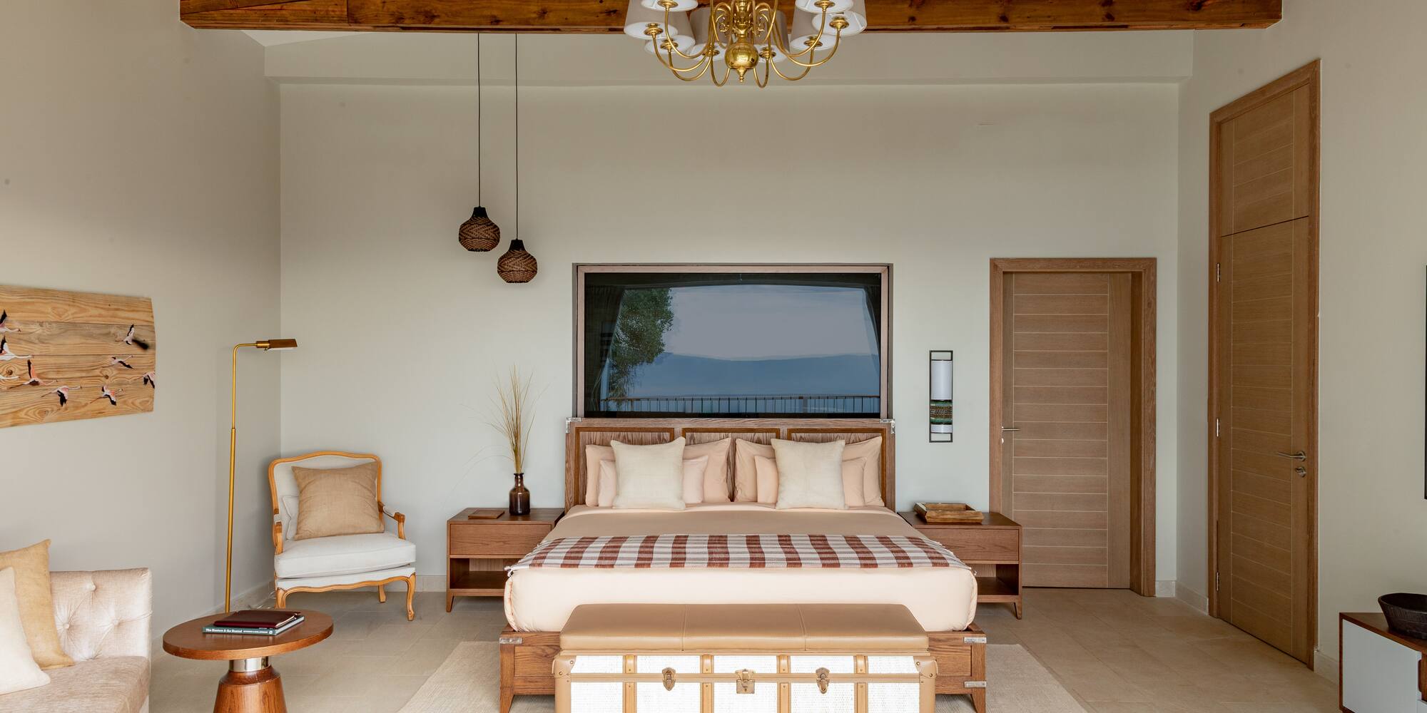 a bedroom with a bed and a couch