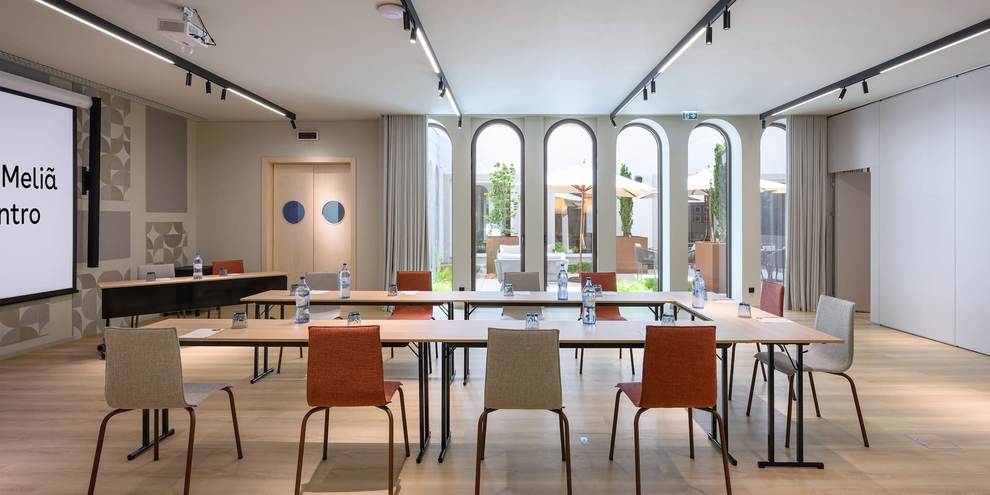 a room with tables and chairs