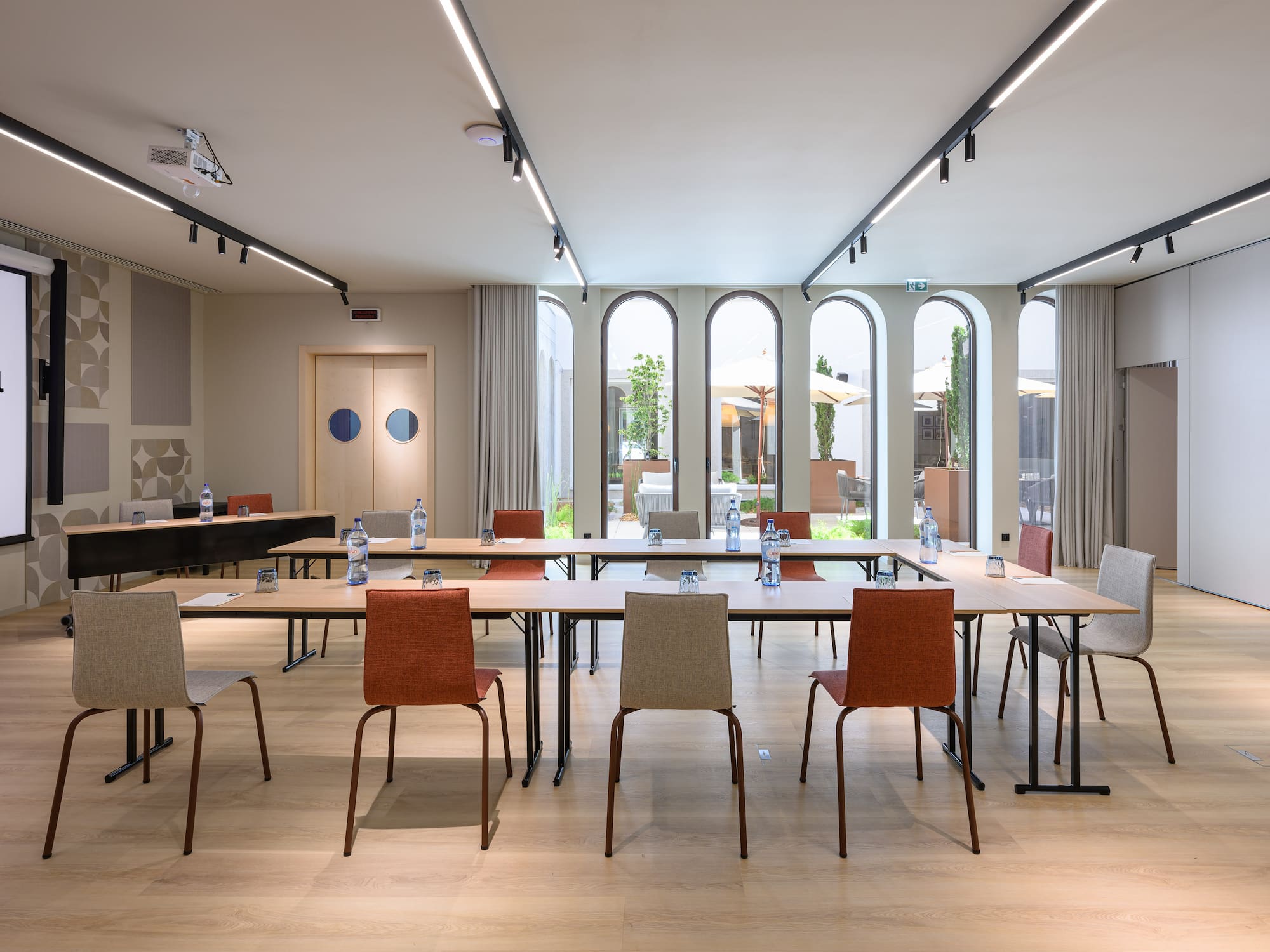 a room with tables and chairs