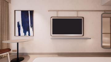 a room with a tv on the wall