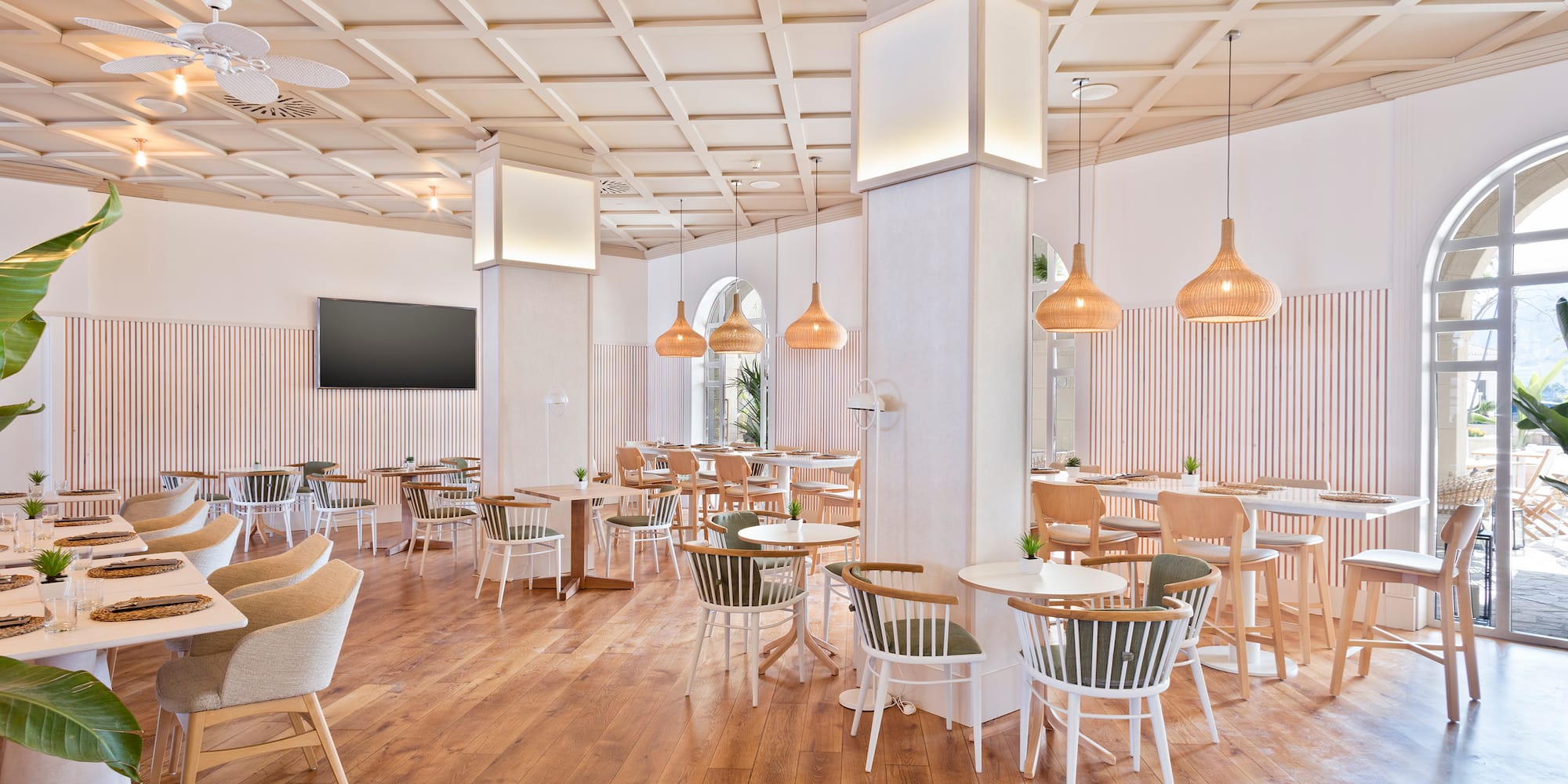 a room with tables and chairs