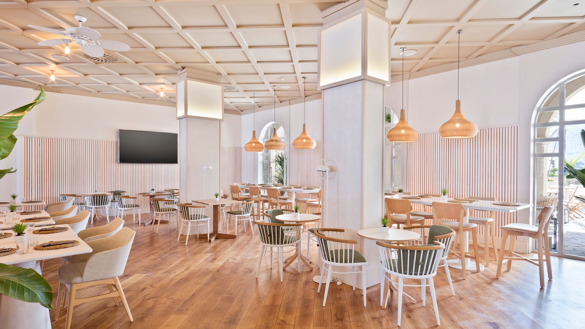 a room with tables and chairs