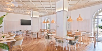 a room with tables and chairs