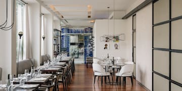 a room with tables and chairs