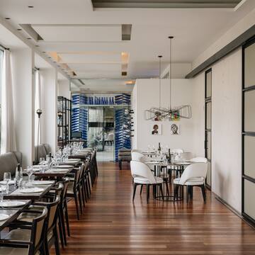 a room with tables and chairs