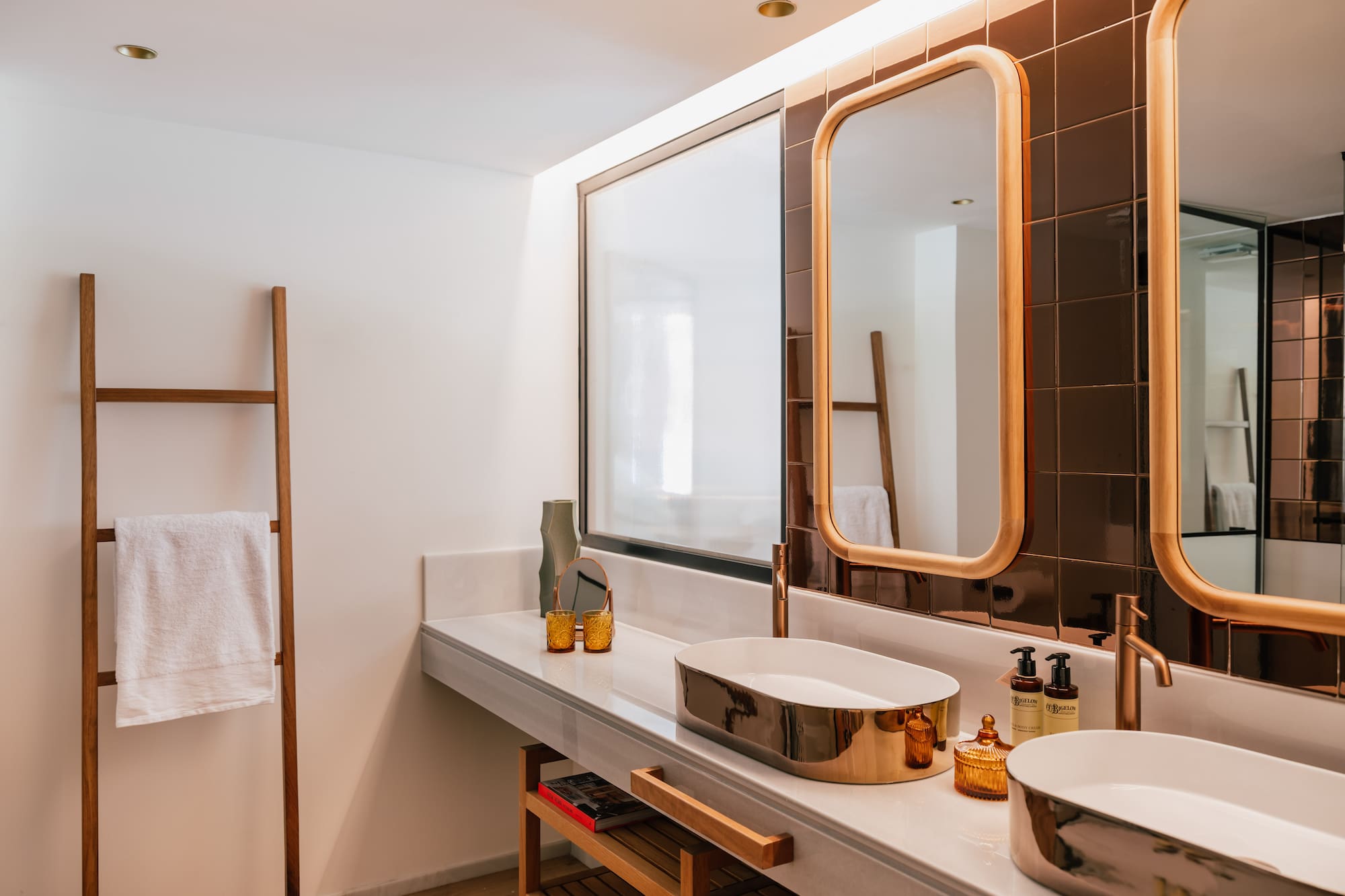a bathroom with a mirror and sinks