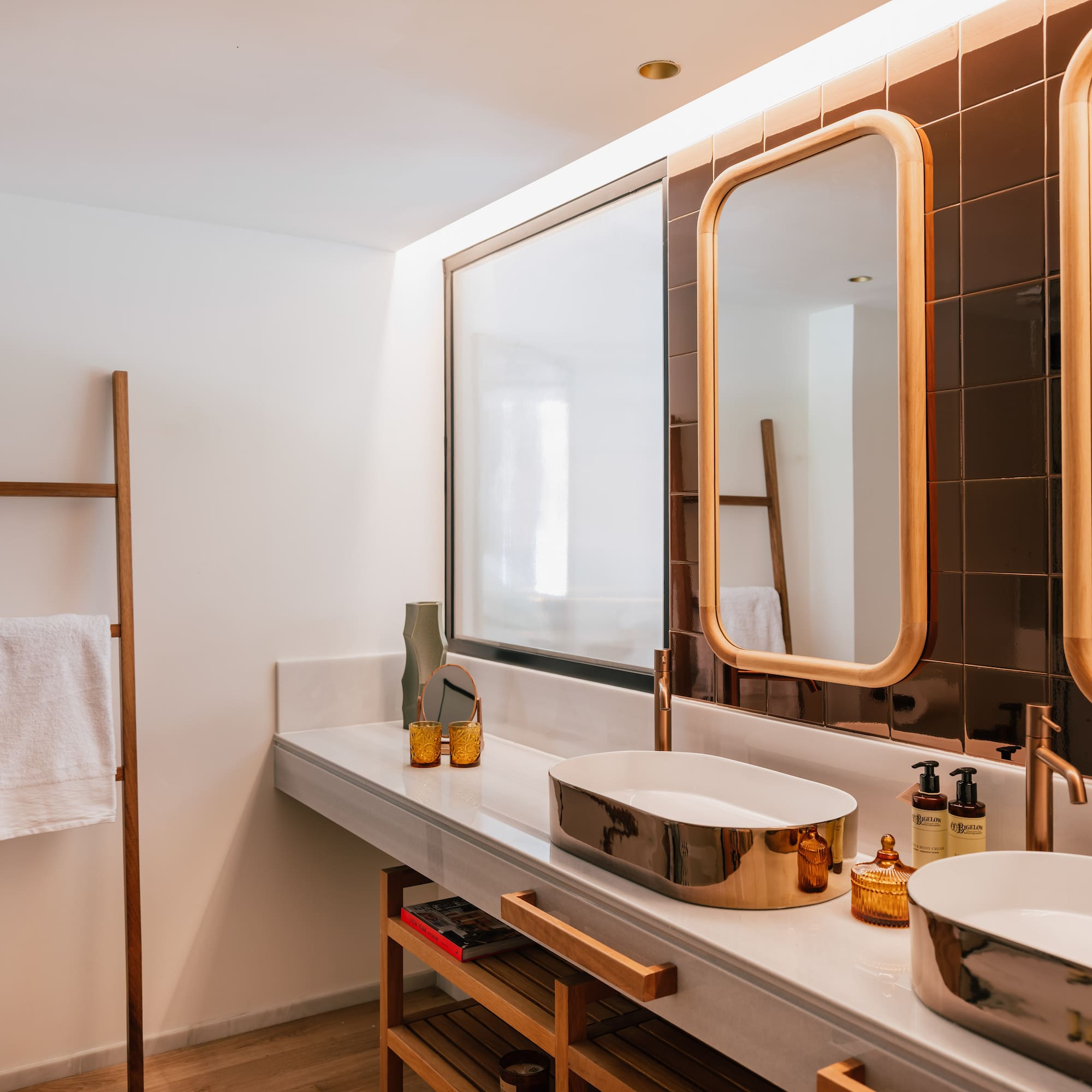 a bathroom with a mirror and sinks