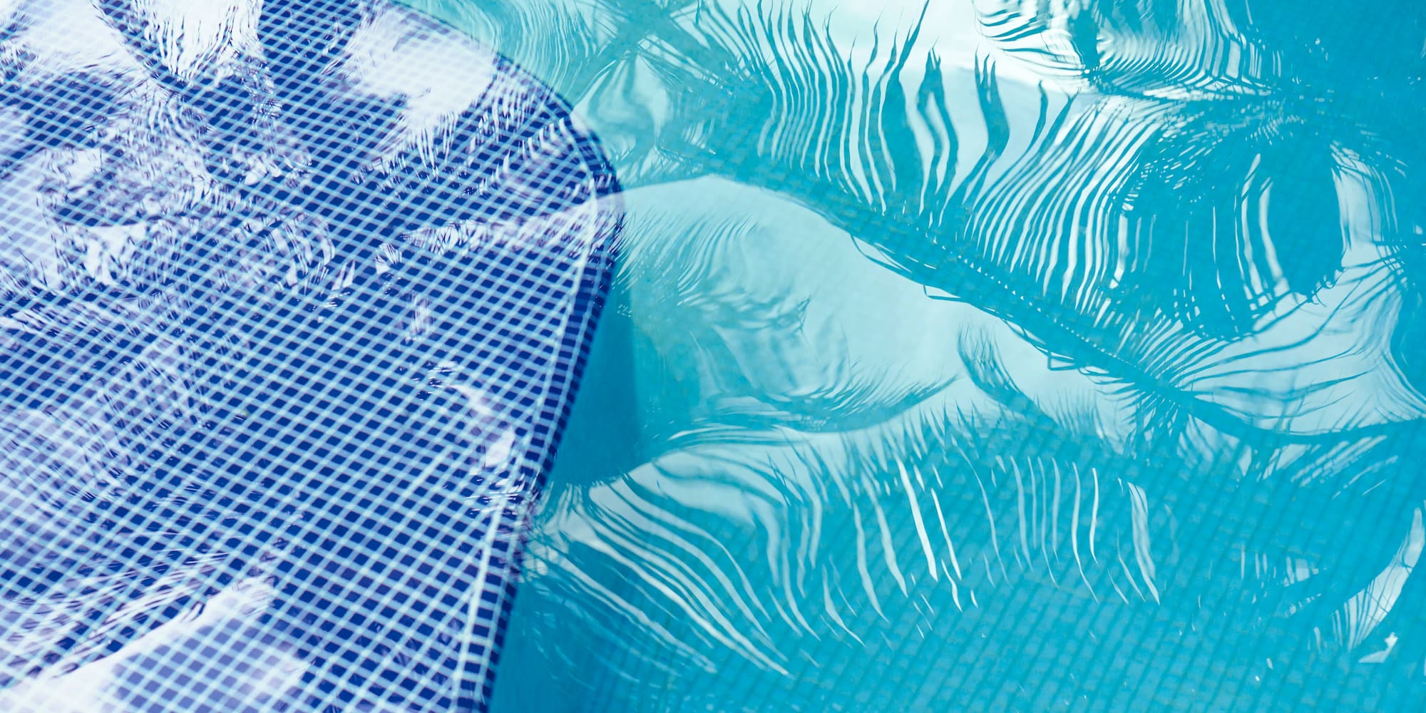 a pool with a blue tile edge