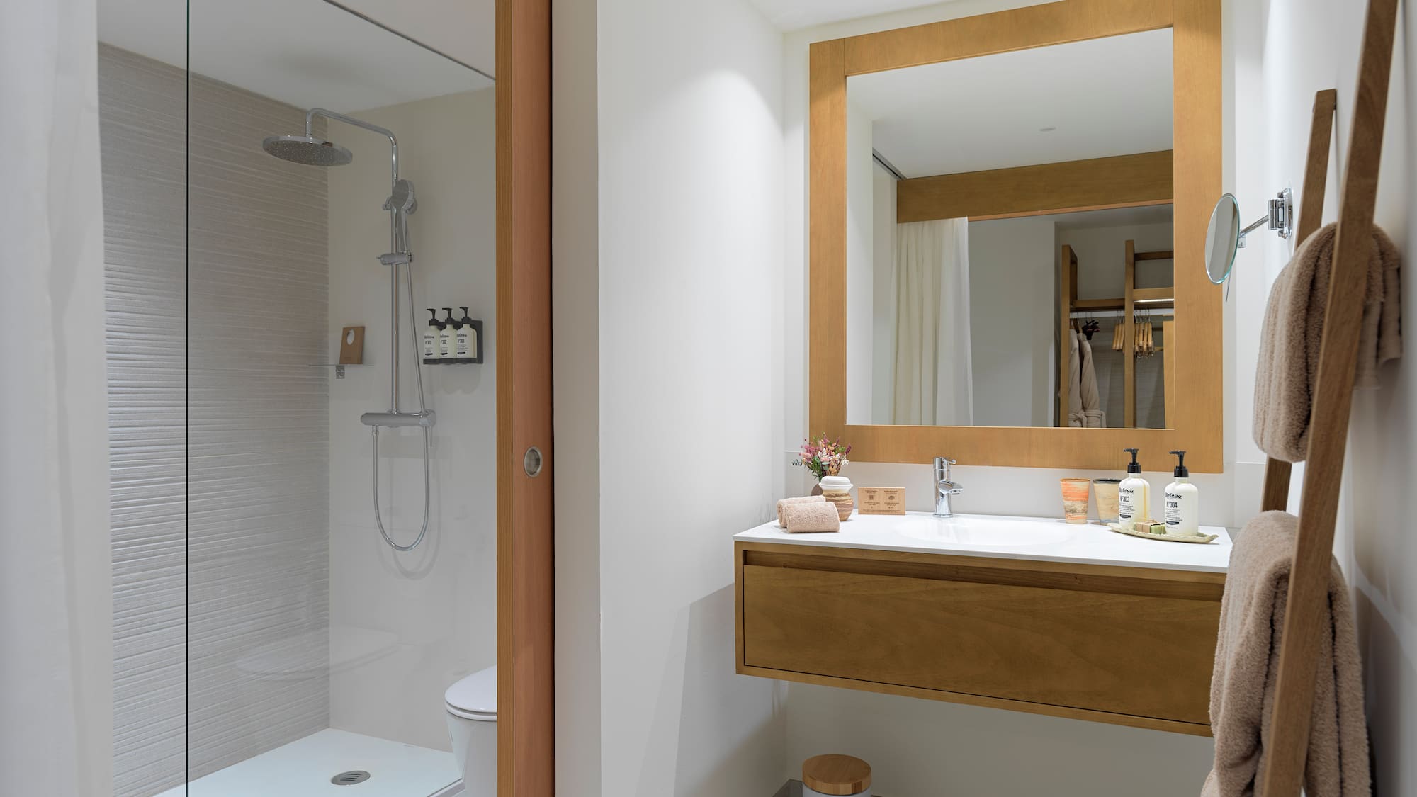 a bathroom with a shower and a sink