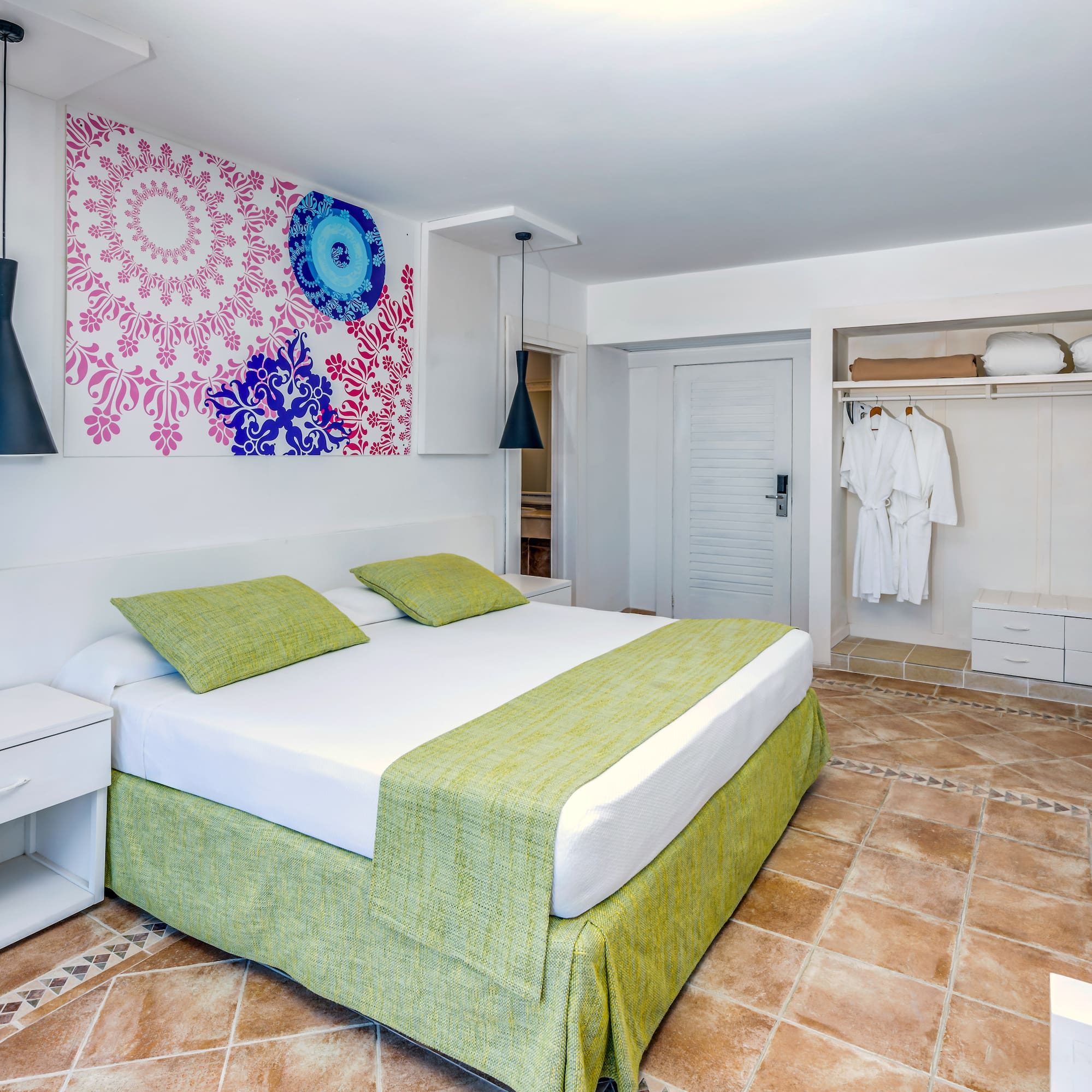 a bedroom with a bed and a closet