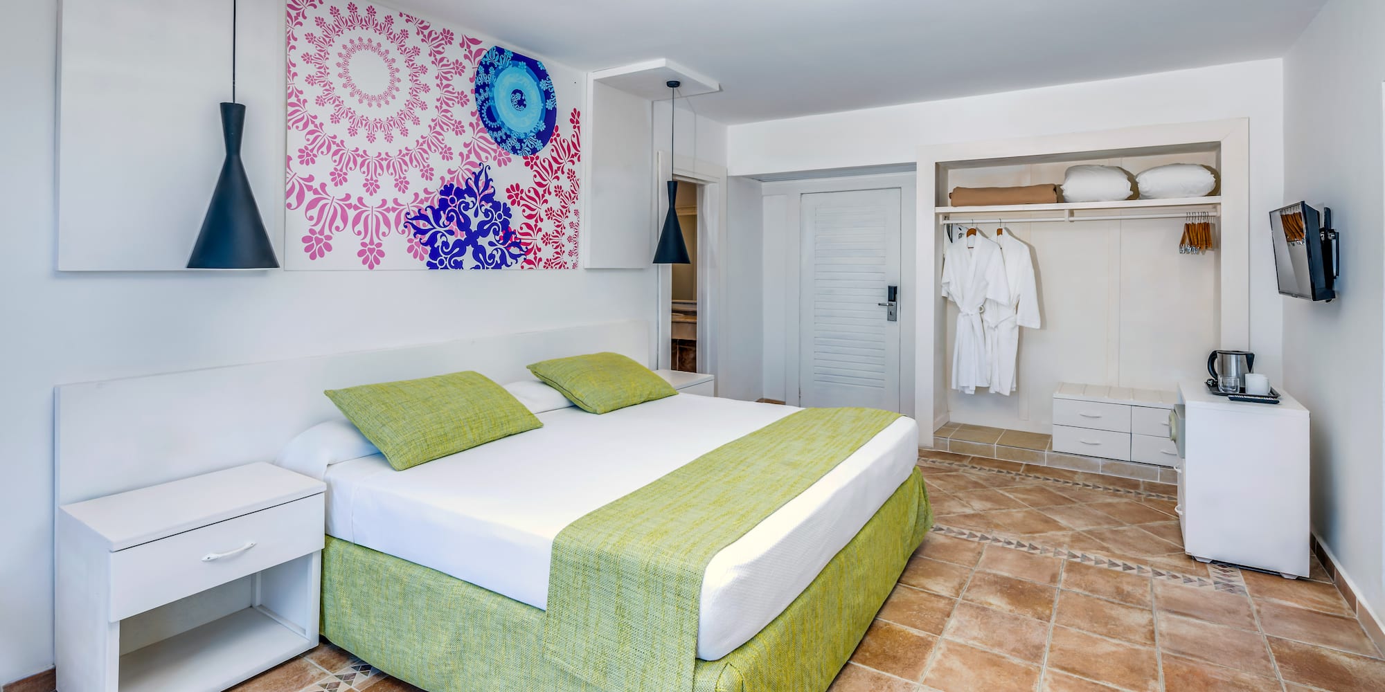 a bedroom with a bed and a closet