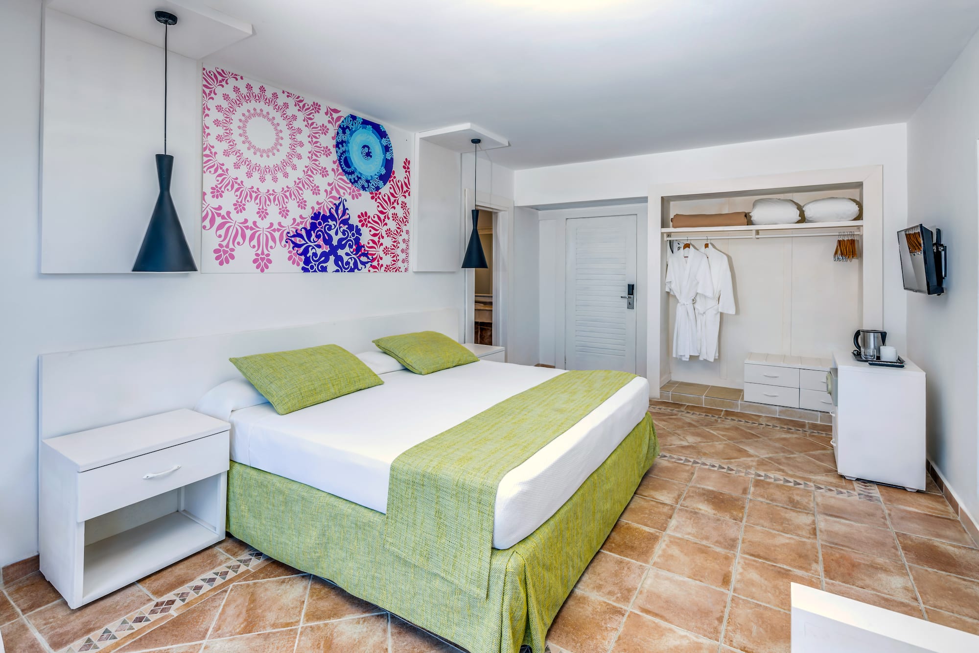 a bedroom with a bed and a closet