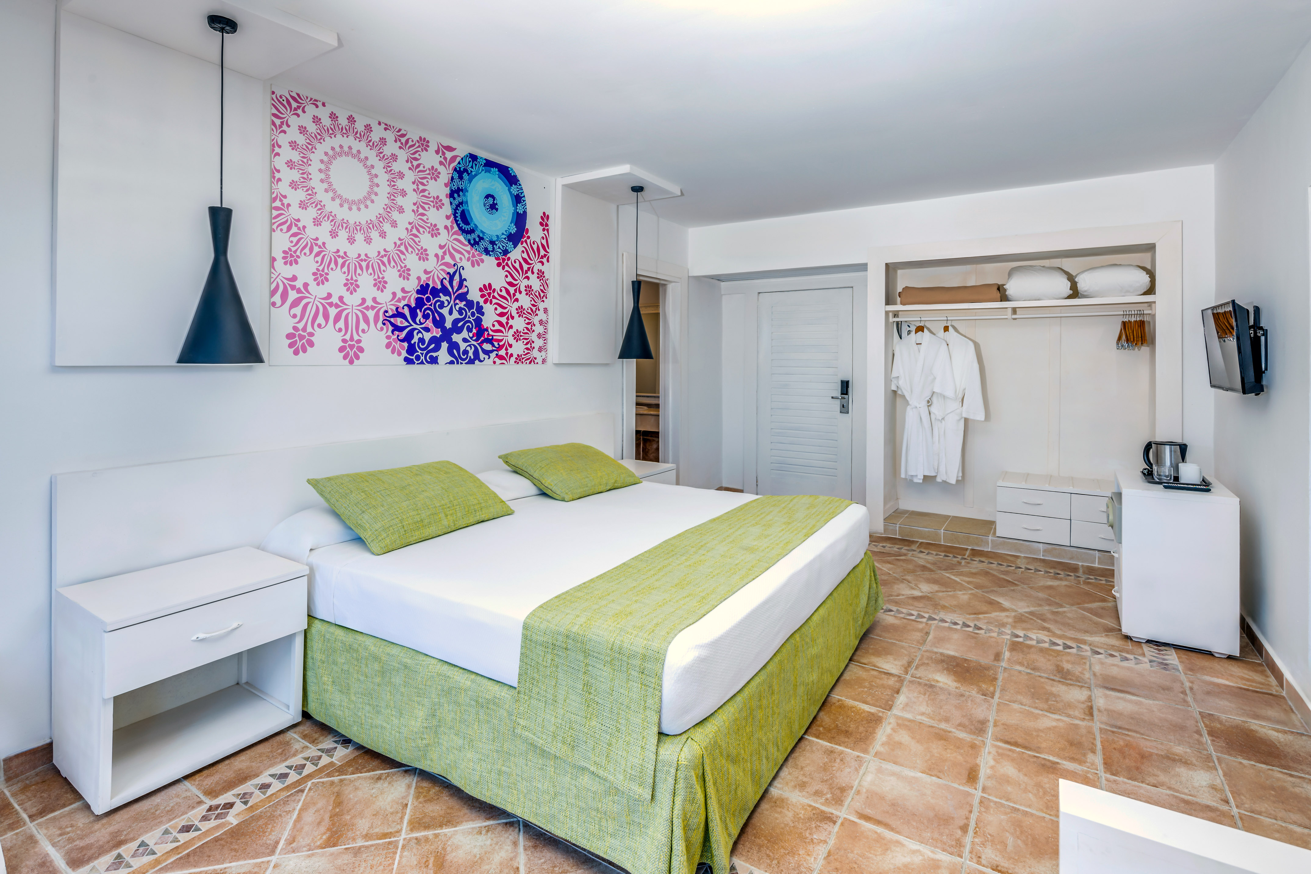 a bedroom with a bed and a closet