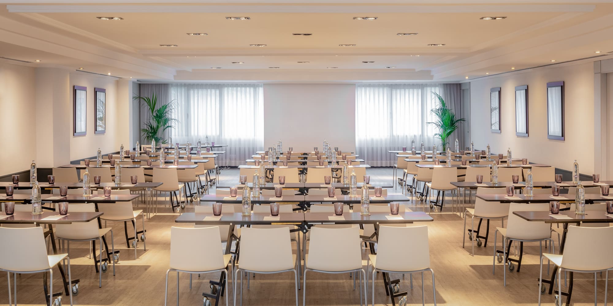 a room with tables and chairs