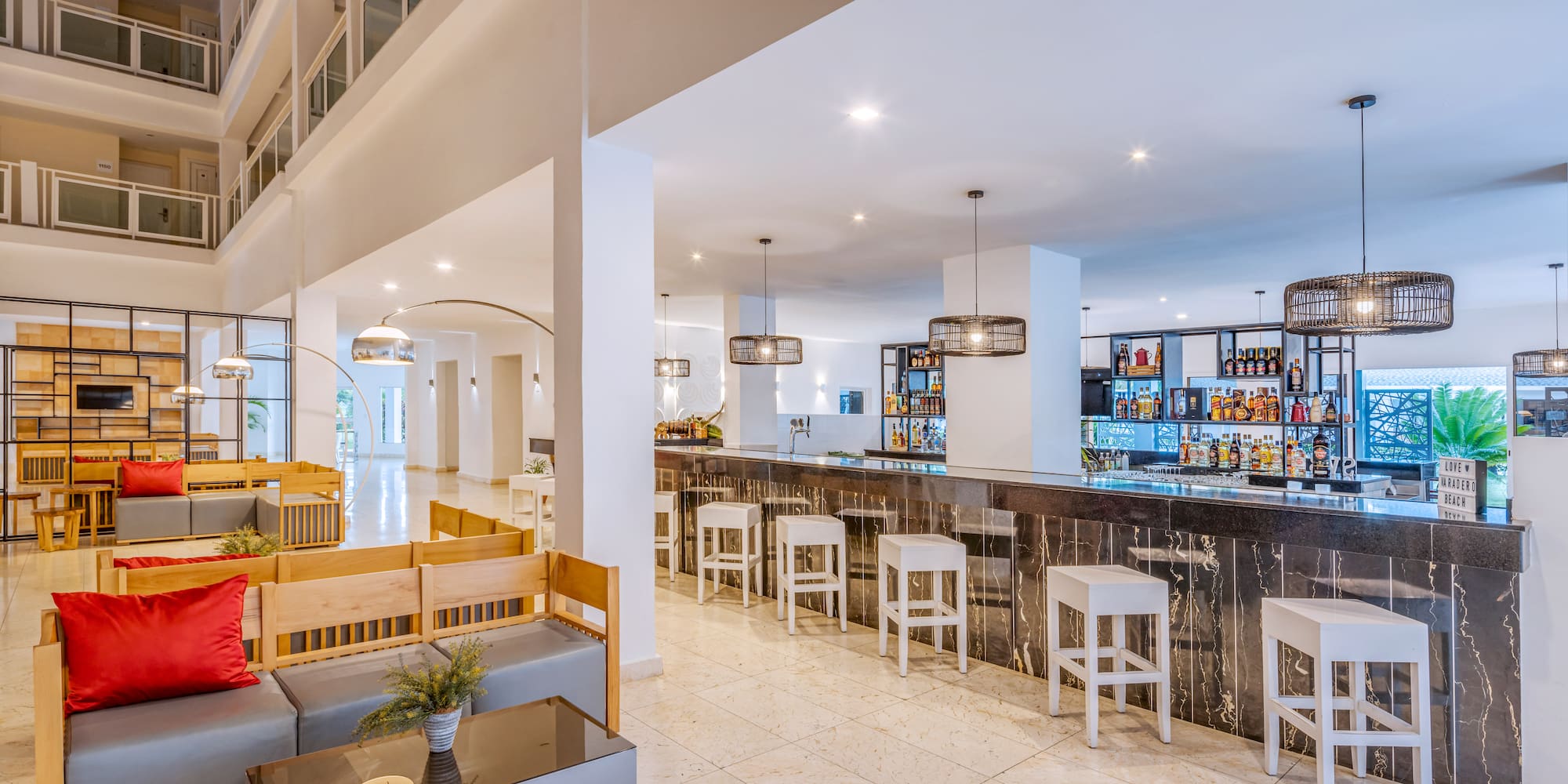a bar with a counter and chairs