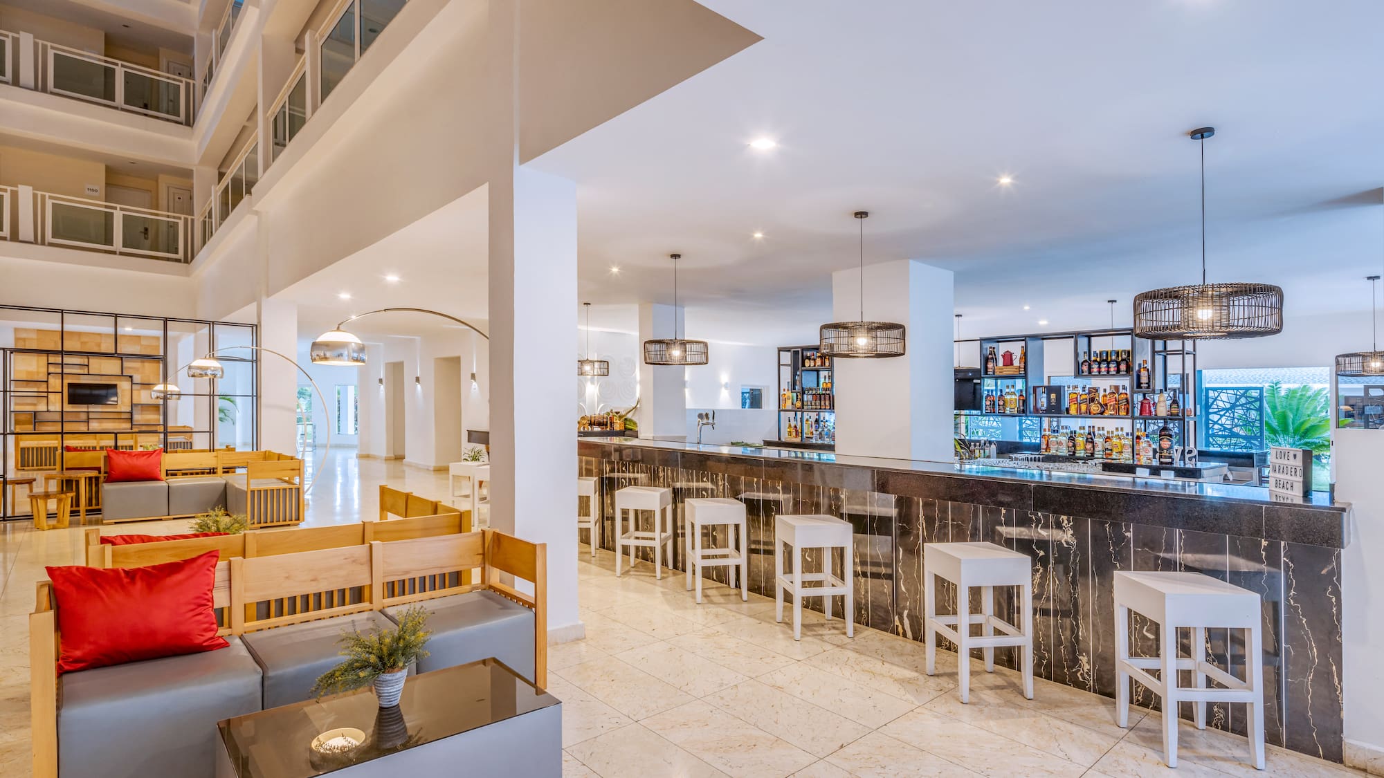 a bar with a counter and chairs