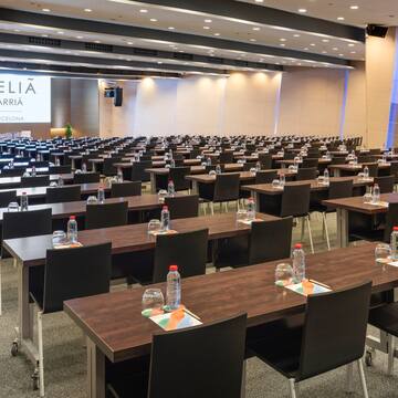 a room with tables and chairs