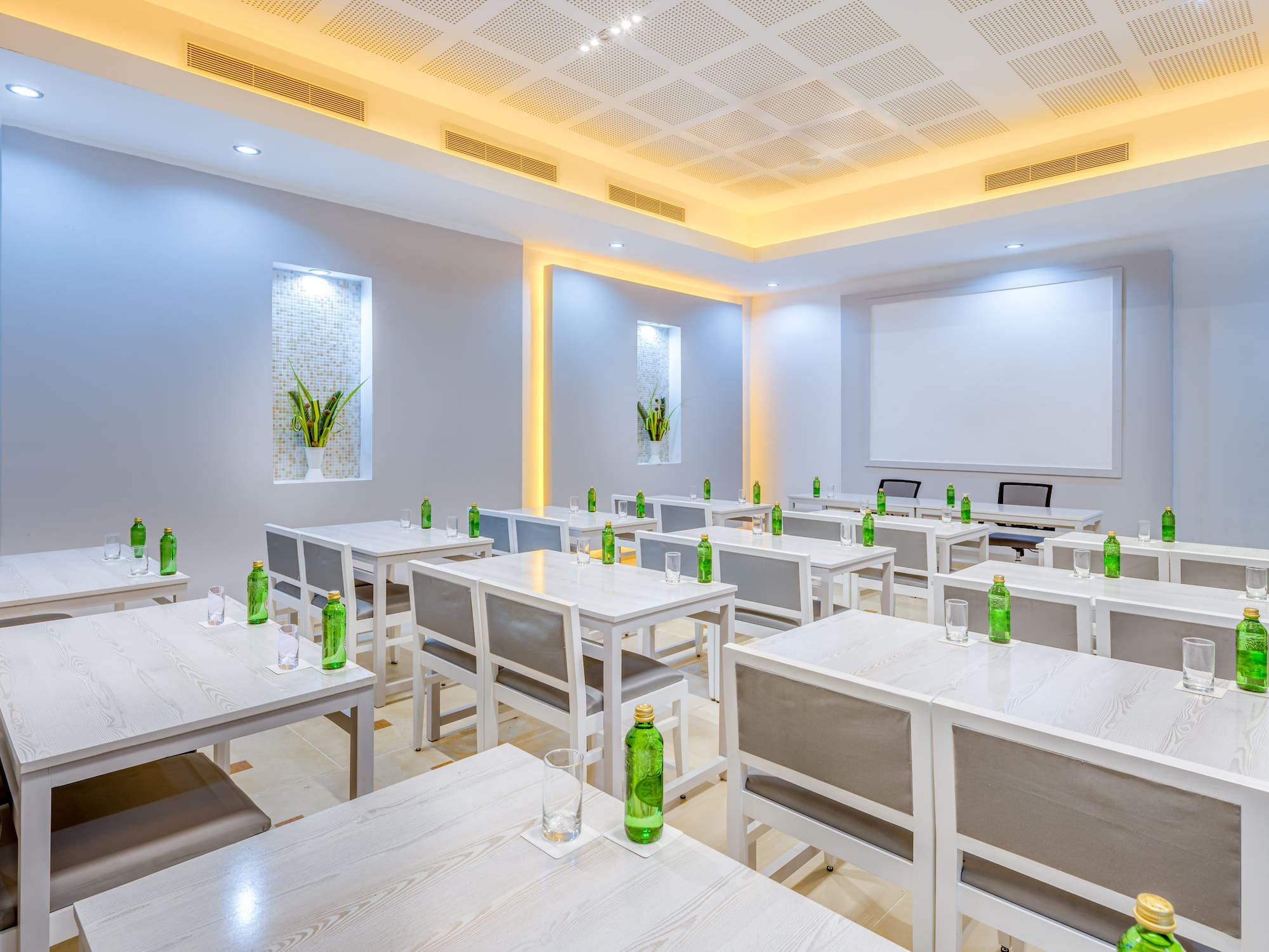 a room with tables and chairs