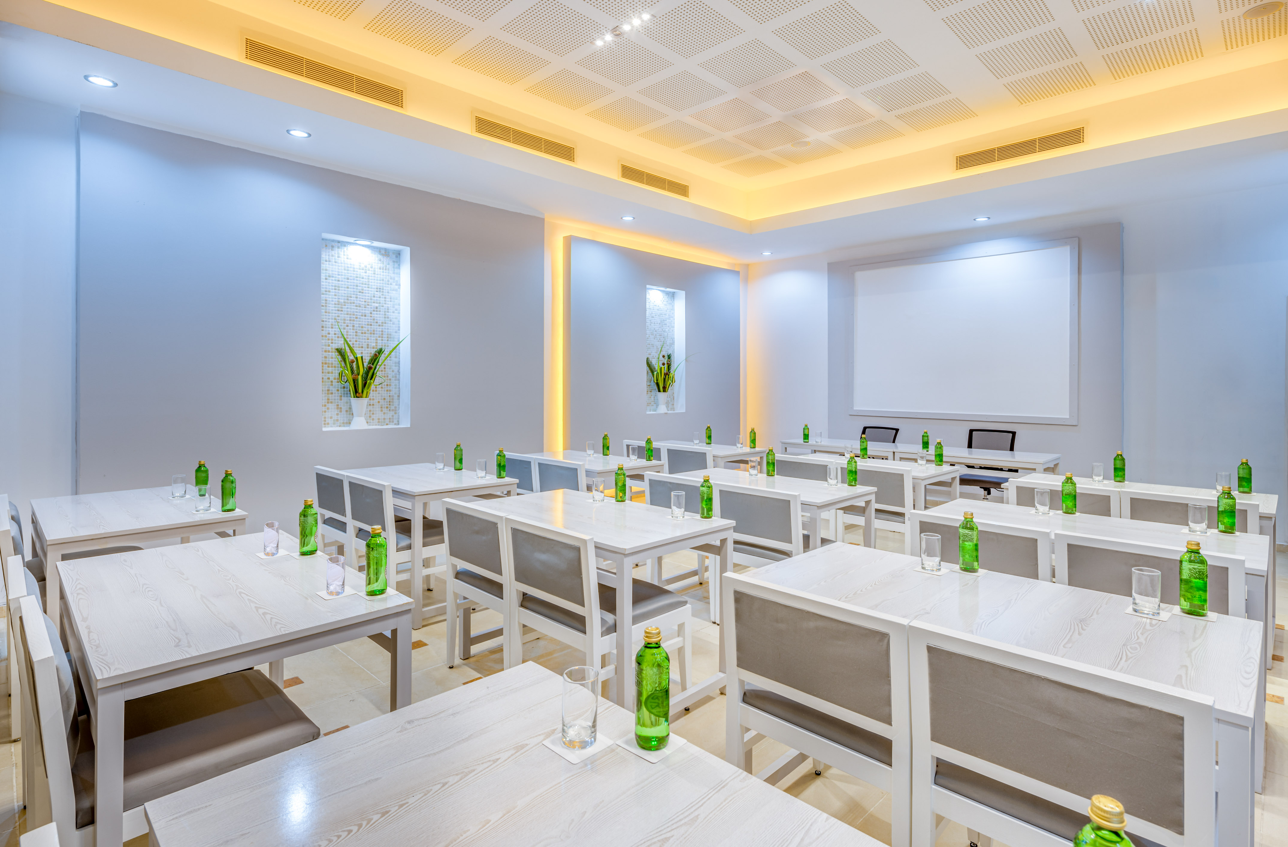 a room with tables and chairs