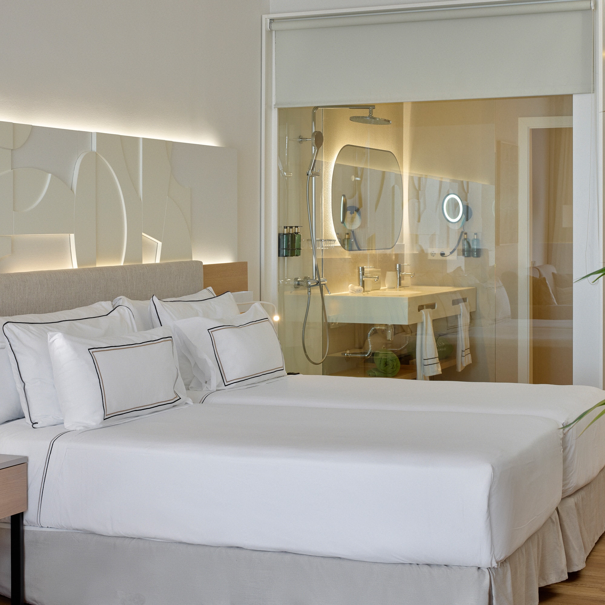 a hotel room with a double bed