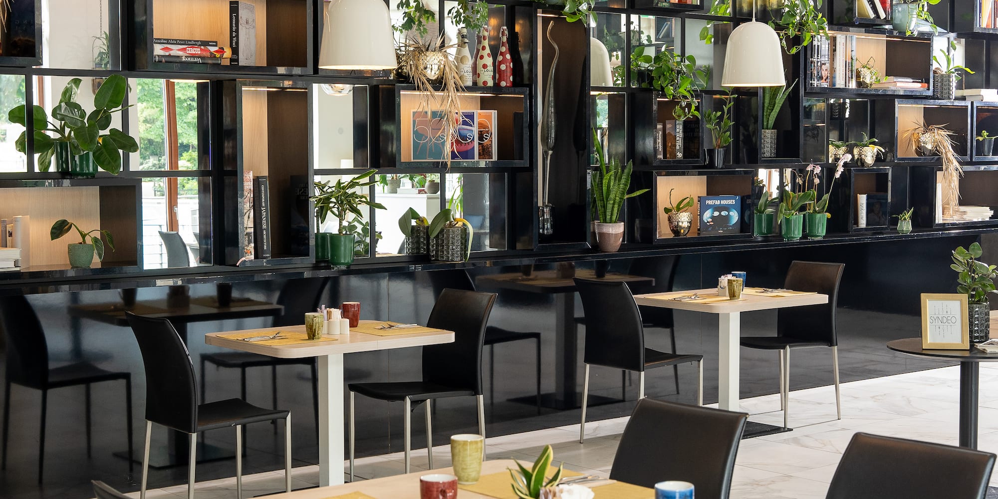 a room with tables and chairs