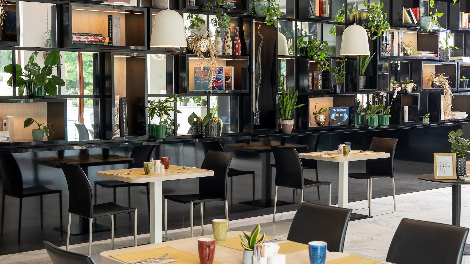 a room with tables and chairs