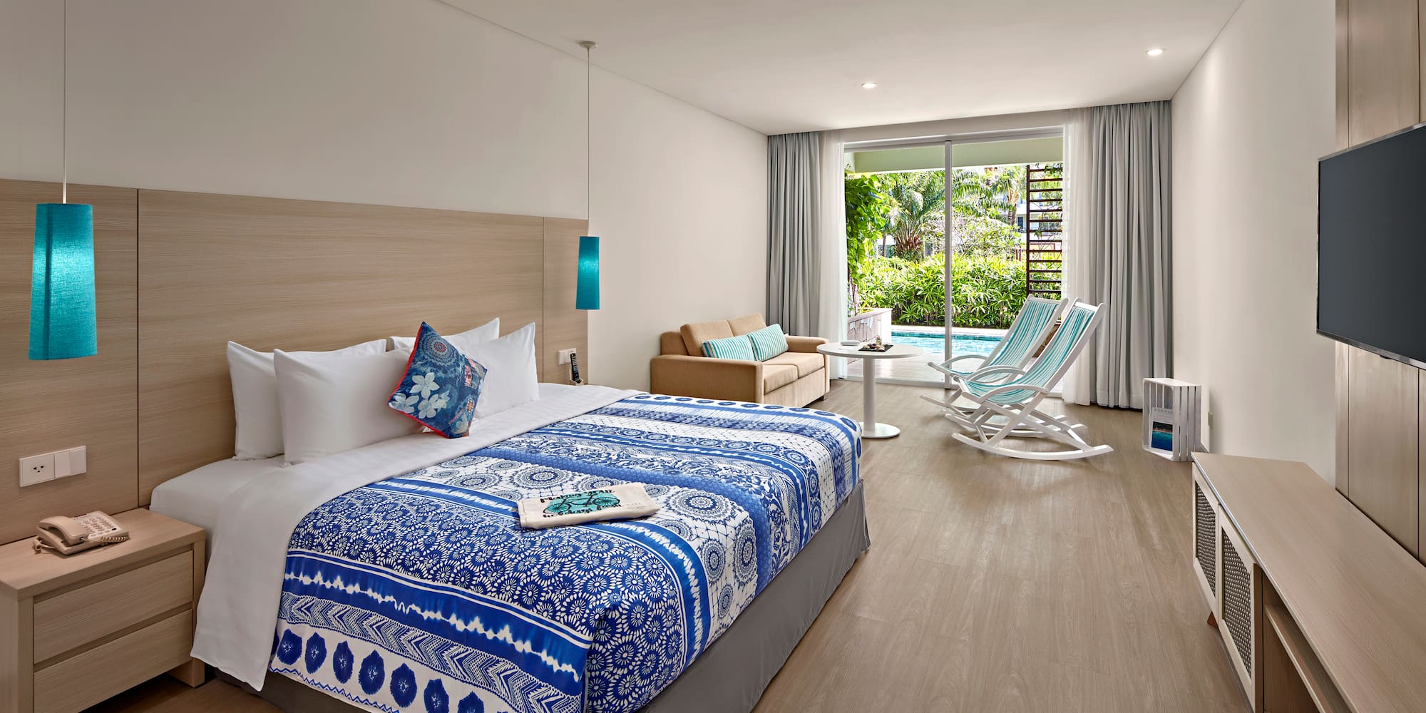 a bedroom with a bed and a chair