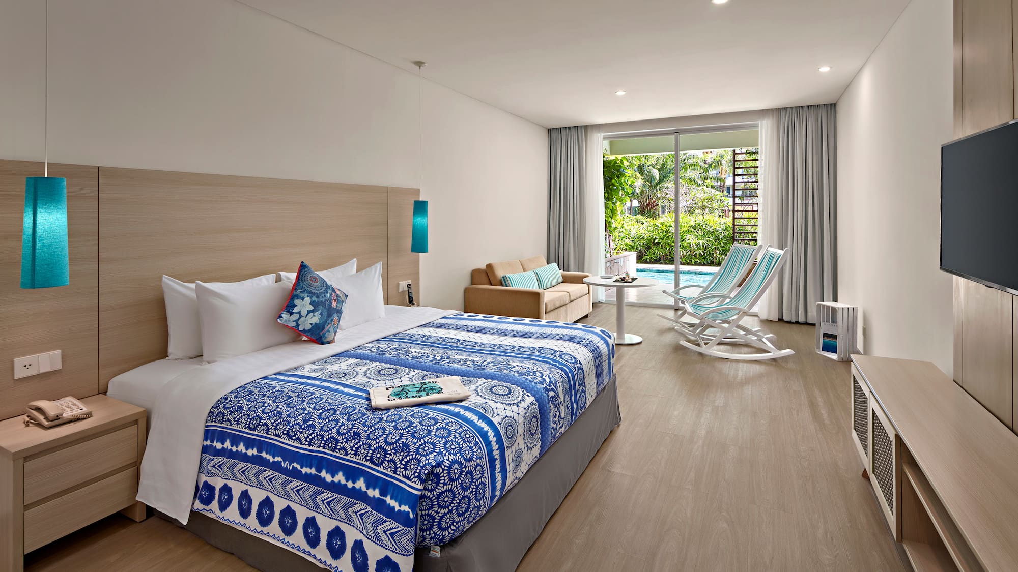 a bedroom with a bed and a chair