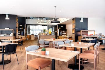 a room with tables and chairs