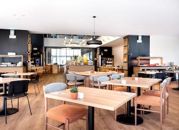 a room with tables and chairs