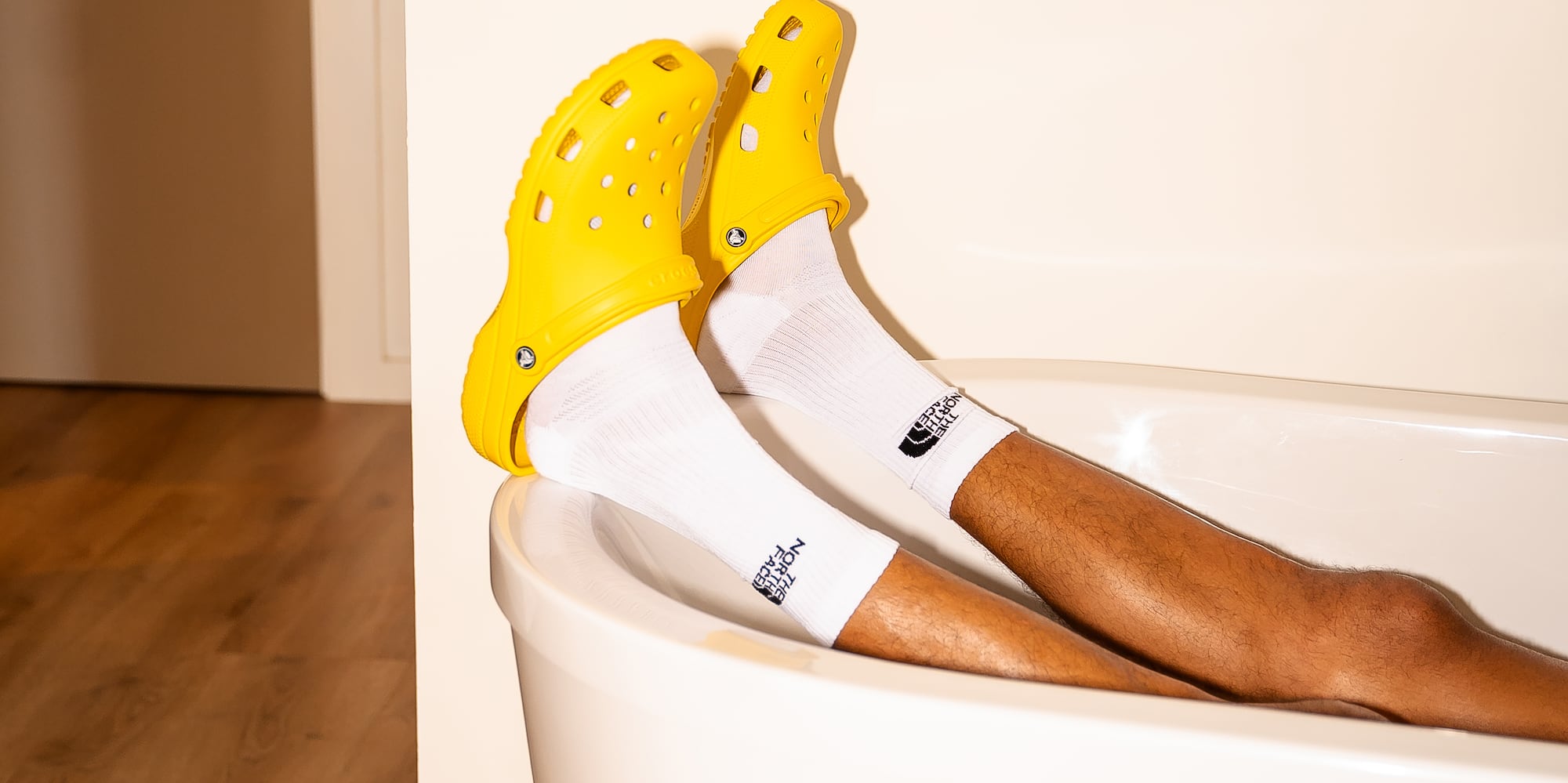 a person's legs in a bathtub