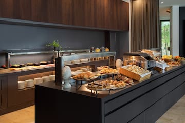 a buffet with food on the counter